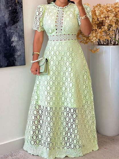 Elegante vestido largo de encaje de manga corta