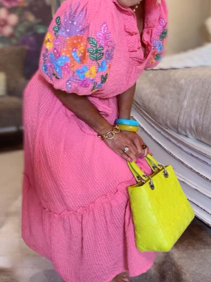 Vestido midi con cinturón y mangas cortas con volantes