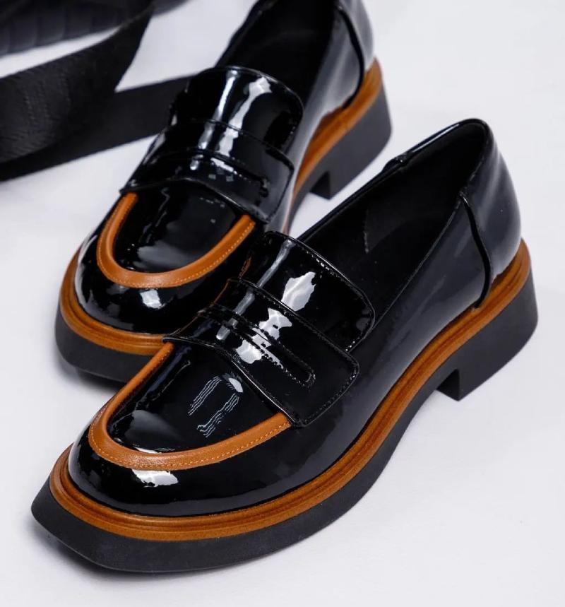 Chic Patent Leather Loafers with Red Trim